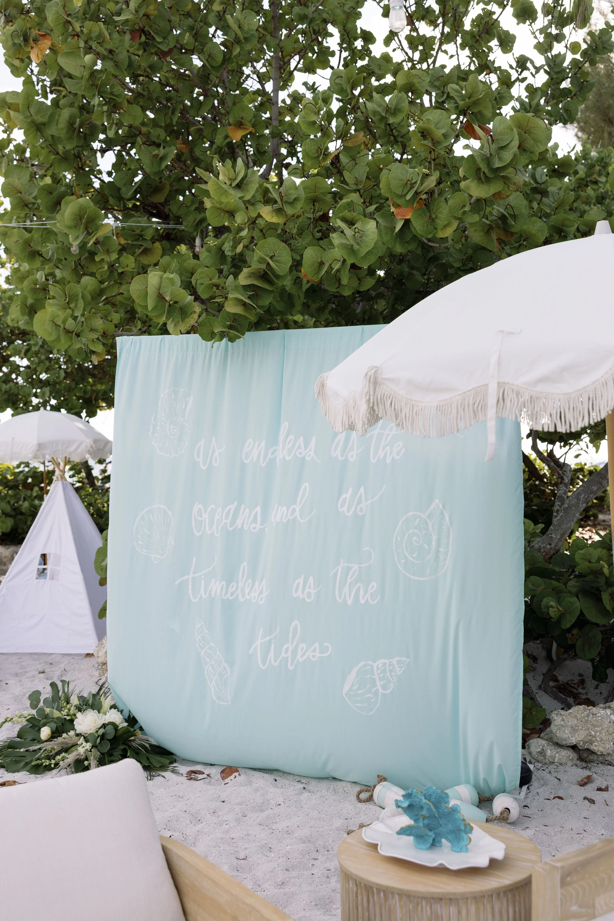 welcome-sign-acrylic-mirror-orchids-beach-grand-pavilion-sandbar-anna-maria-island-wedding.jpg