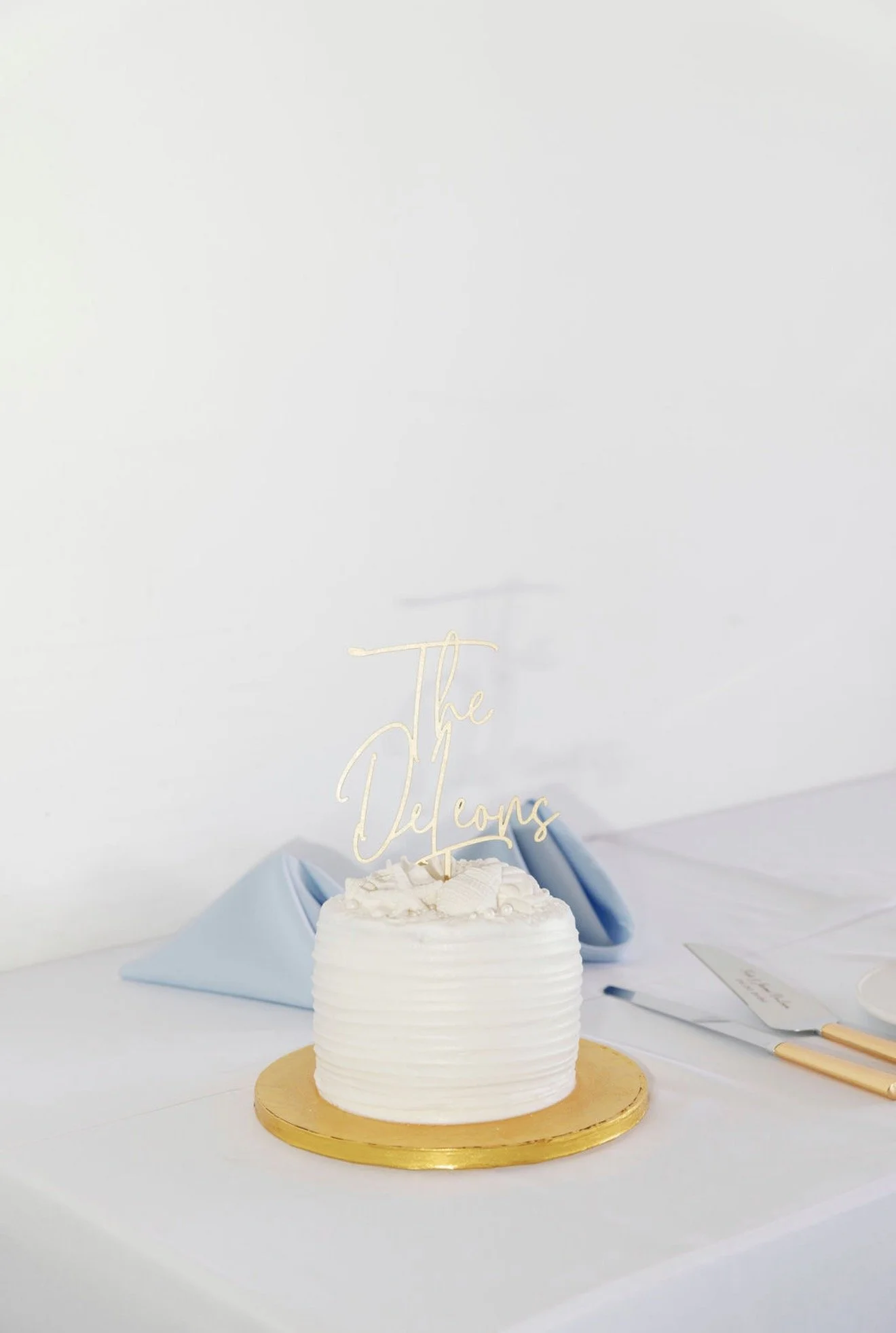 candle-lantern-detail-blue-linen-beach-house-brunch-anna-maria-island-wedding.png