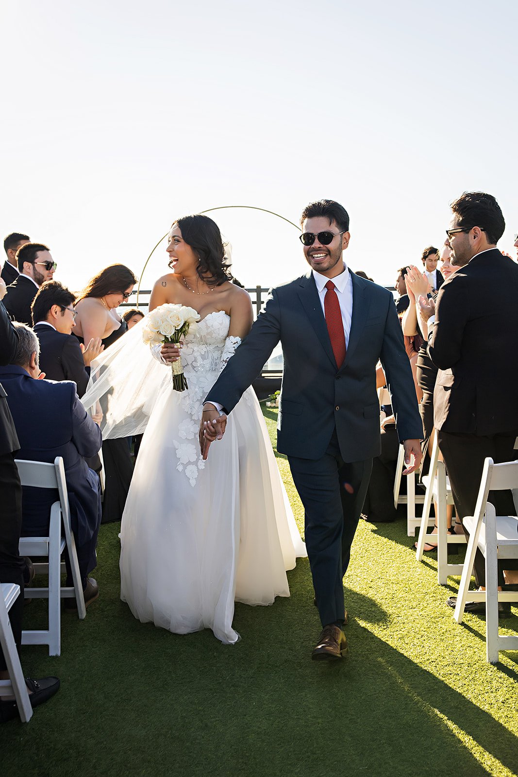 Ground ceremony florals designed on-site for a modern Hotel Zamora wedding