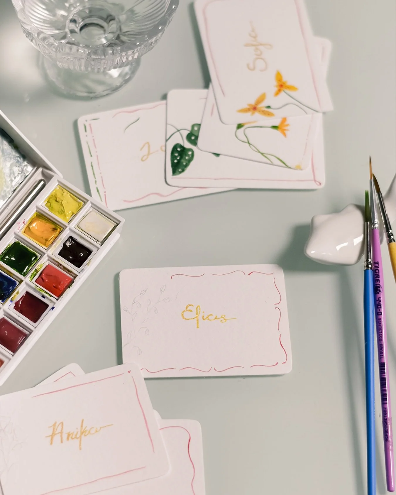 Tiny works of art, made to hold a name.
 Each sitting name is handwritten in ink and paired with watercolor florals &mdash; one by one, no copy-paste here.
 Because even the smallest detail deserves intention, and every guest deserves to feel seen.
?