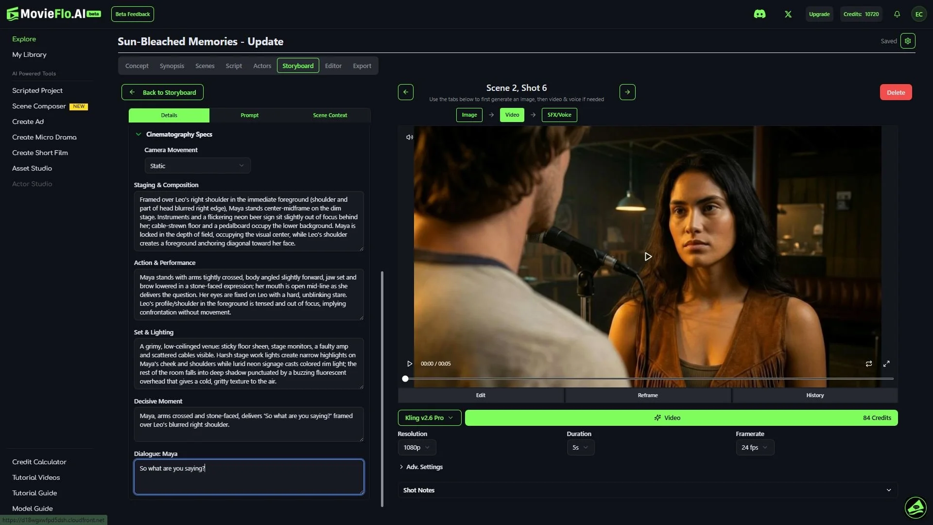 A scene from a film or TV show features a woman with long dark hair wearing a sleeveless brown top, standing in front of a microphone with a man whose back is to the camera. The setting appears to be a dimly lit bar or cafe with warm lighting.