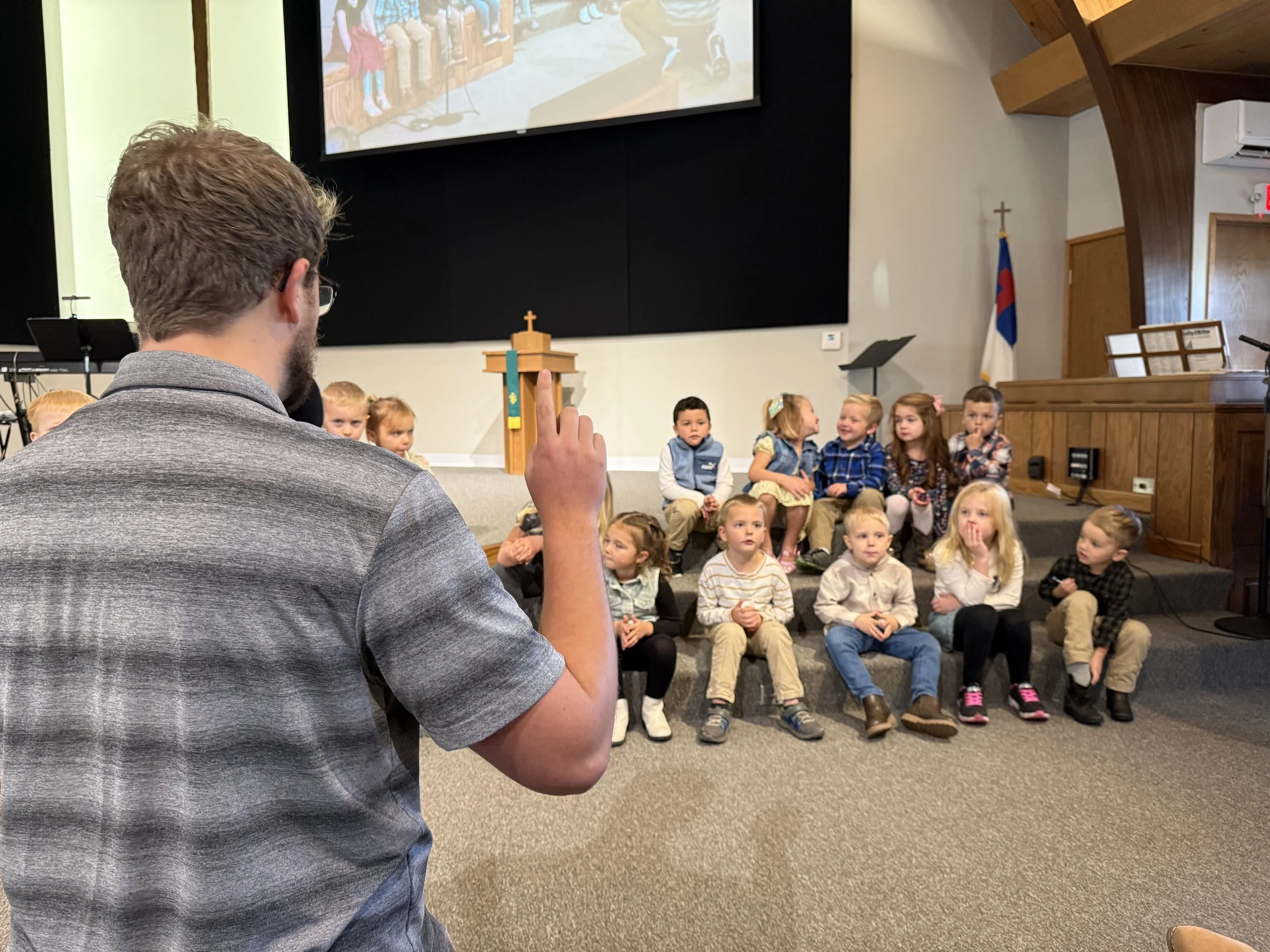 Jack, our Director of Student Ministries, sharing message with our kids