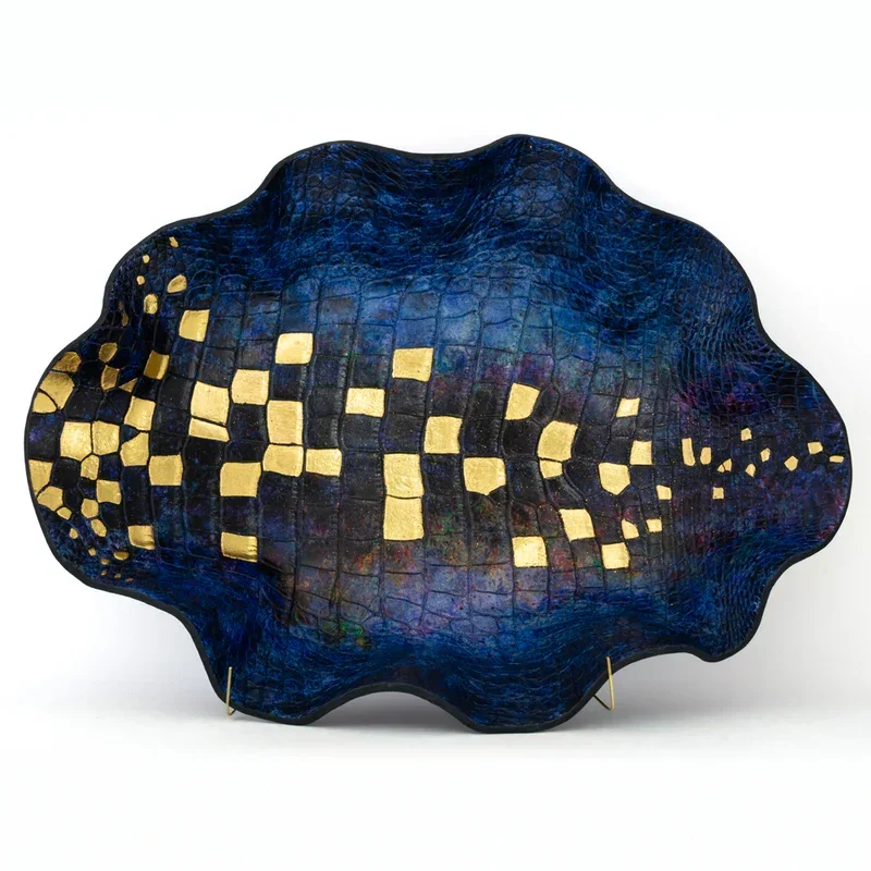 Arc of the Moral Universe
17.25 x 22.25 x 4.875 in
Alligator leather, dye, 24 karat gold leaf