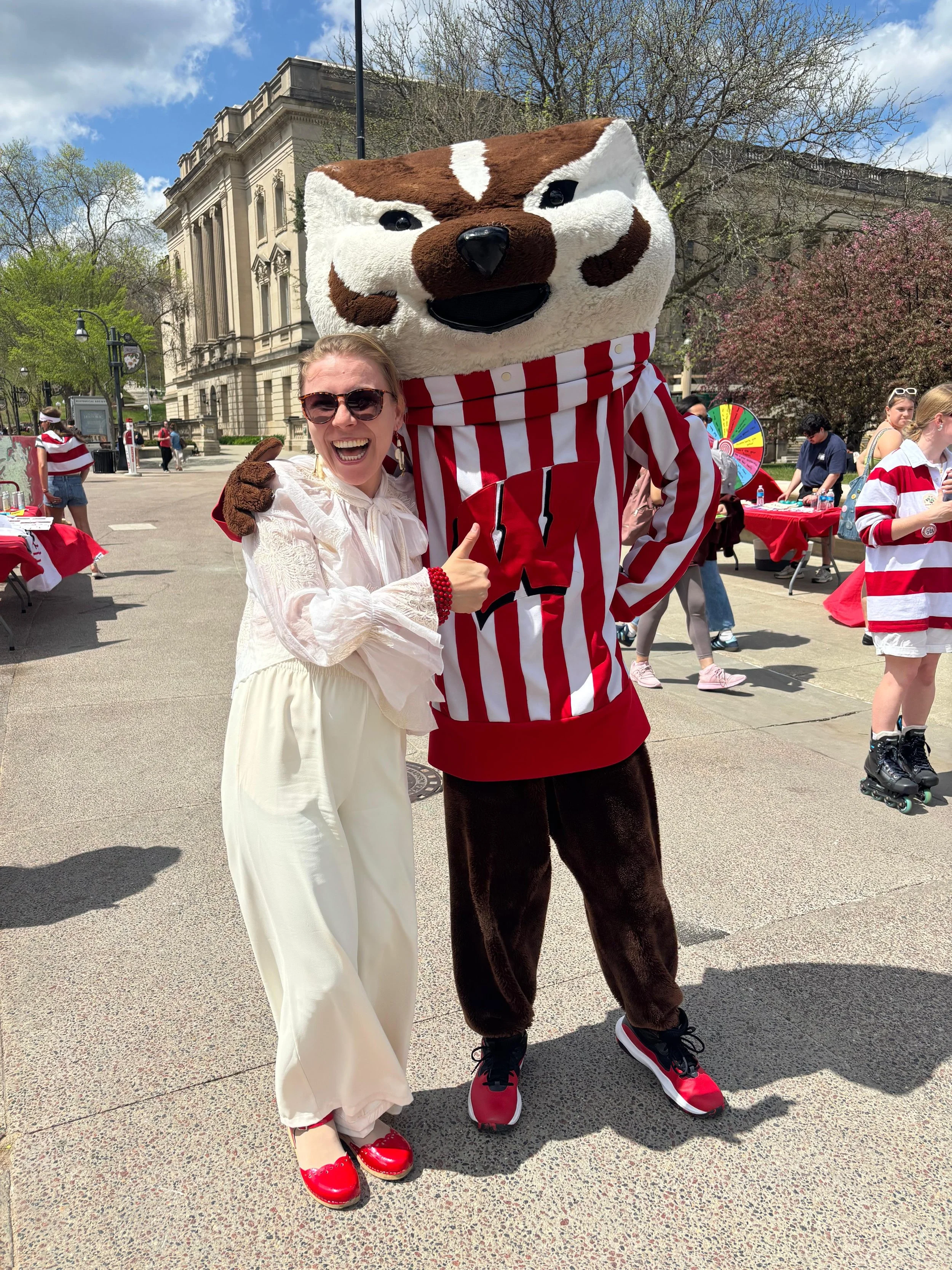 Taya with Bucky Badger, the official mascot of  UW-Madison.