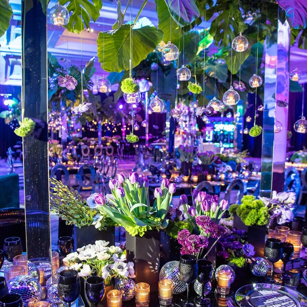 When the details do the talking. 🌿✨ Hanging terrariums, lush tropicals, disco balls and a purple glow -ties it all together for a tropical inspired celebration. 
#LinzieEvents #EventDesign #TablescapeDesign #SouthFloridaEvents