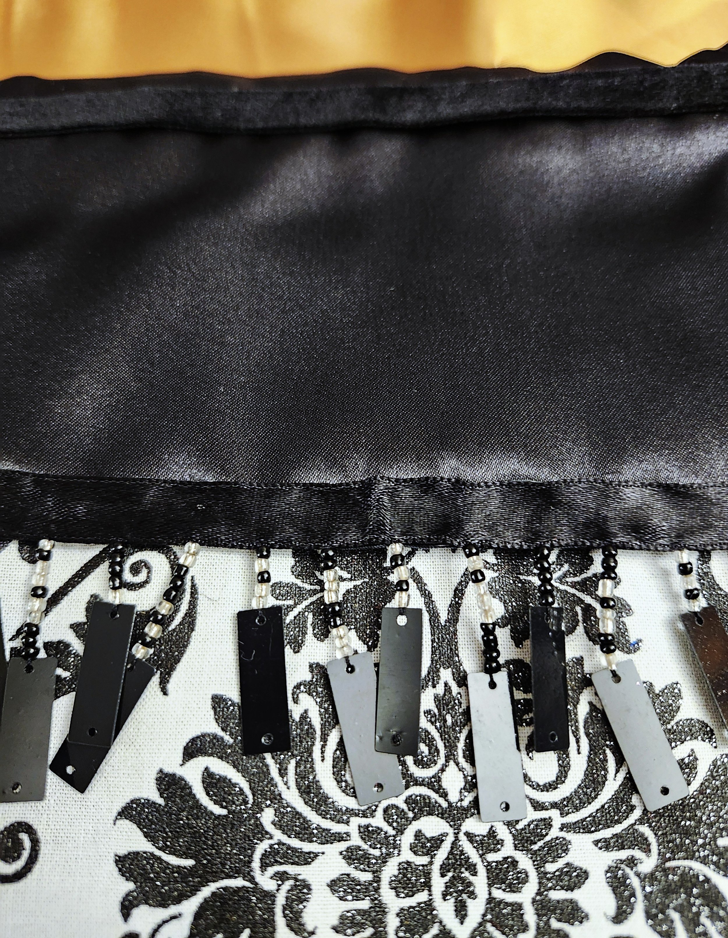 stocking - b&w filigree closeup gold bkgrd.jpg