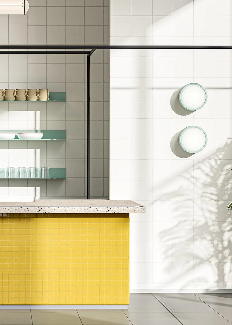 Sunny yellow Cedro tiles in a kitchen setting – bold System colors for playful, modern interiors.