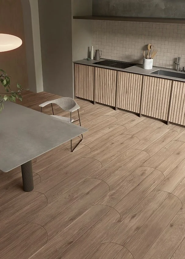 Warm-toned Cocoon porcelain tile used in a soft modern interior, evoking natural materiality.