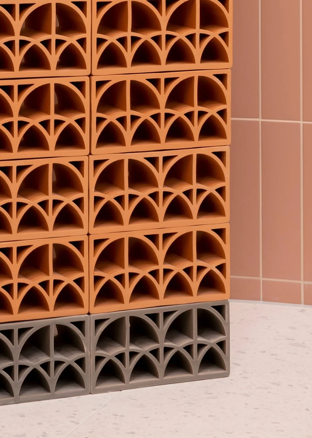 spirare’s Split Loop Matte tiles in a sculptural grid of handcrafted ceramic.