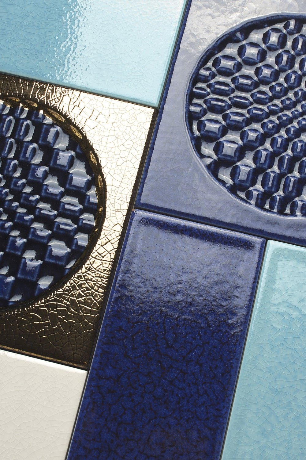 Città di Faenza tile in cobalt blue with artisan décor relief finish.