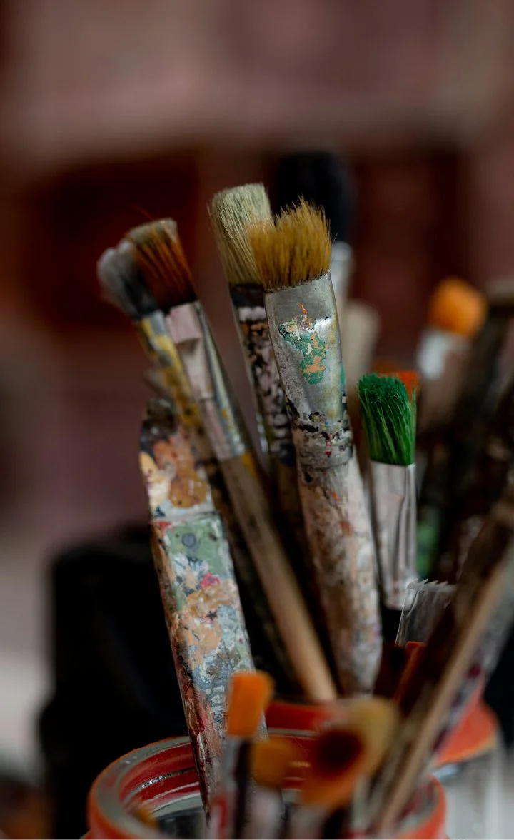 Artist paintbrushes with colorful handmade patina