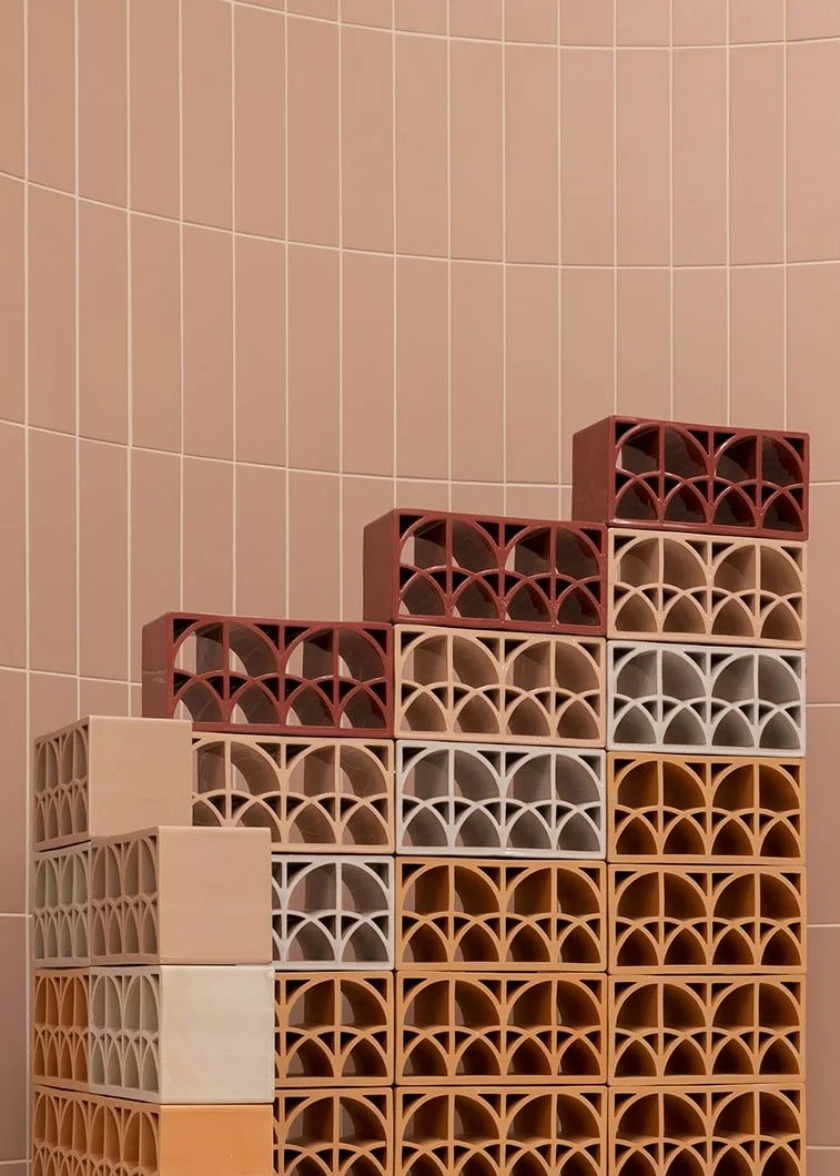 Natural matte finish breeze blocks creating rhythm and openness in interior walls.