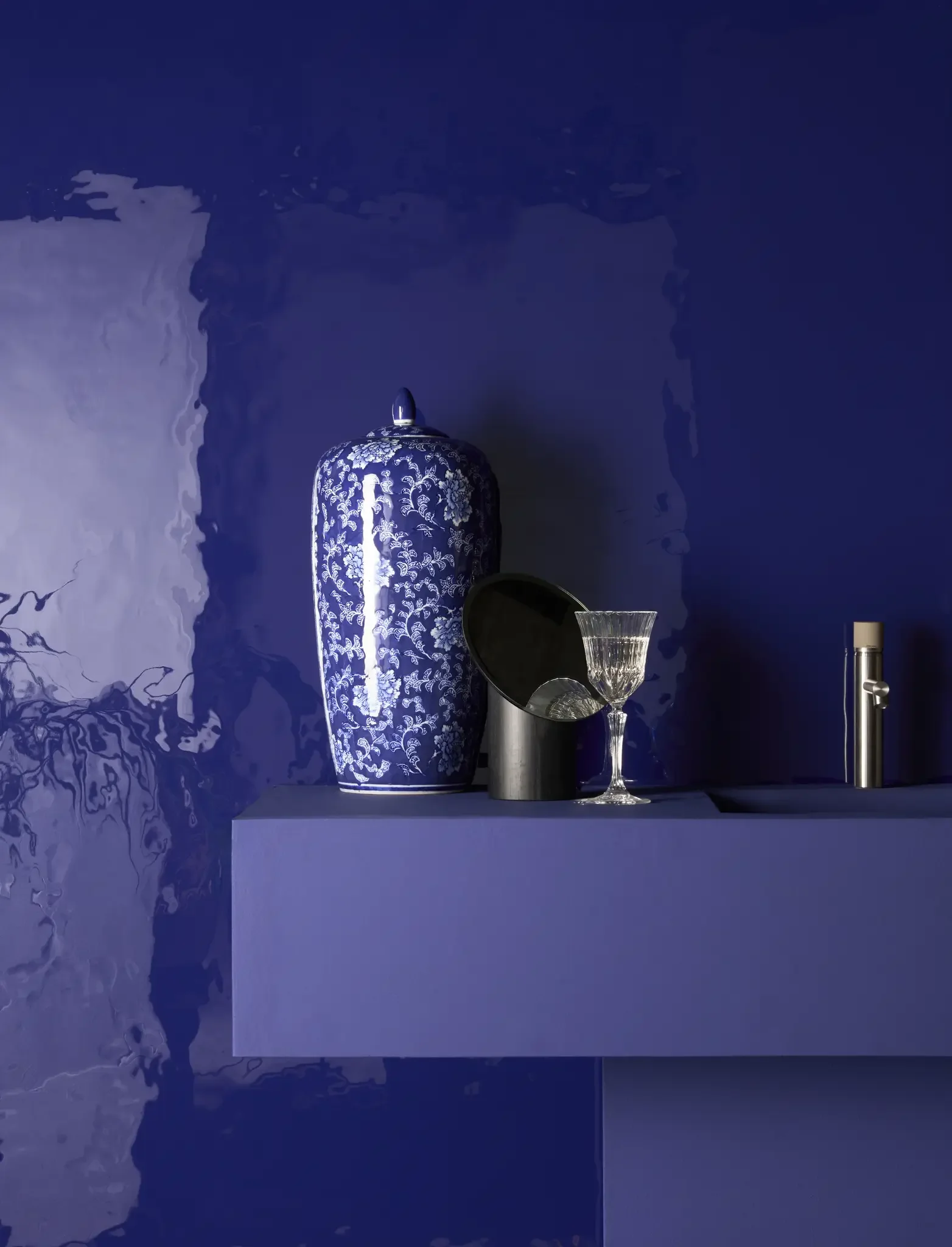 L'Eau Klein glossy porcelain tile inspired by the movement of water in deep blue tones