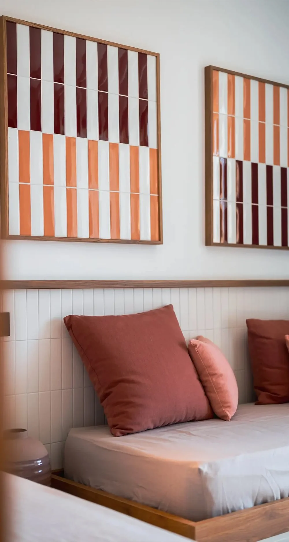 Terracotta interior with geometric wall art