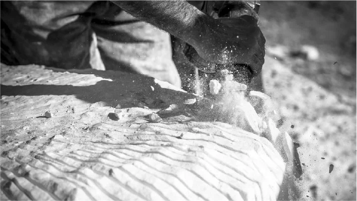 Artisan hands shaping a textured surface