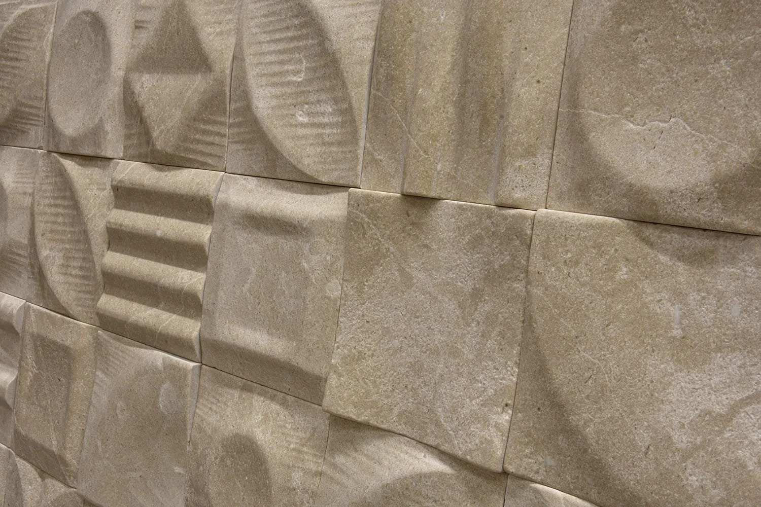 Handmade Savana stone tile featuring dimensional relief patterns inspired by contemporary architecture