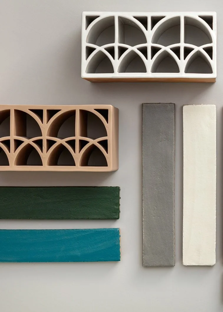 Earth-toned ceramic tile arches showcasing artisanal detailing and form.