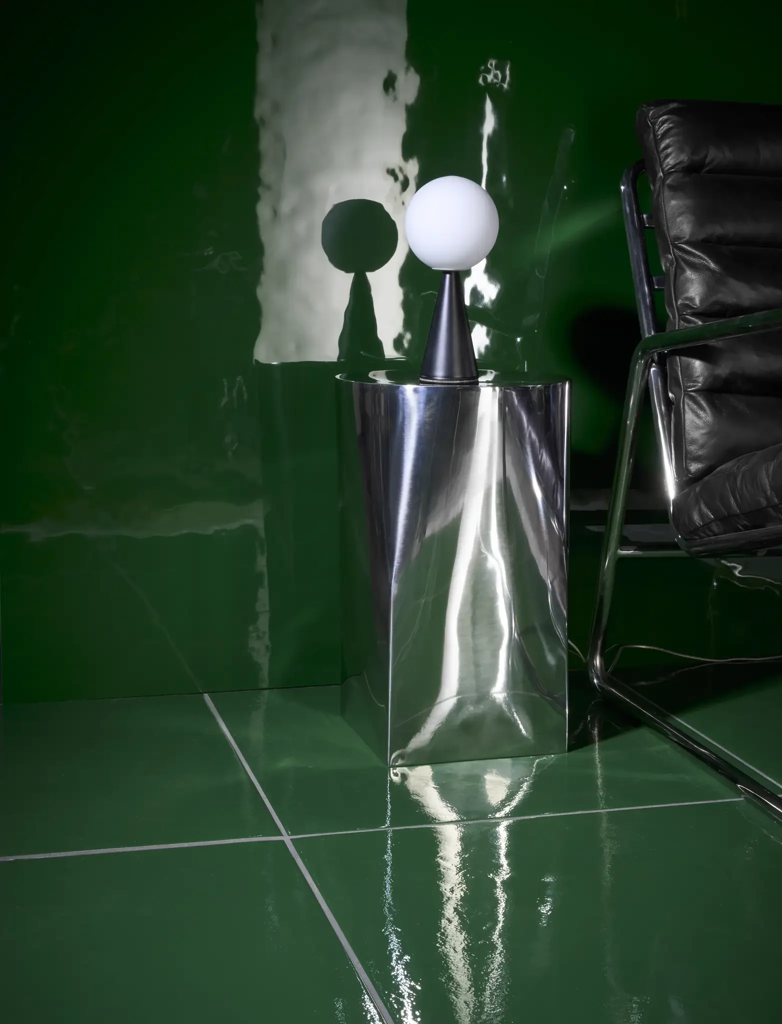 L'Eau Jade glossy porcelain tile featuring reflective green glaze and organic water-inspired movement