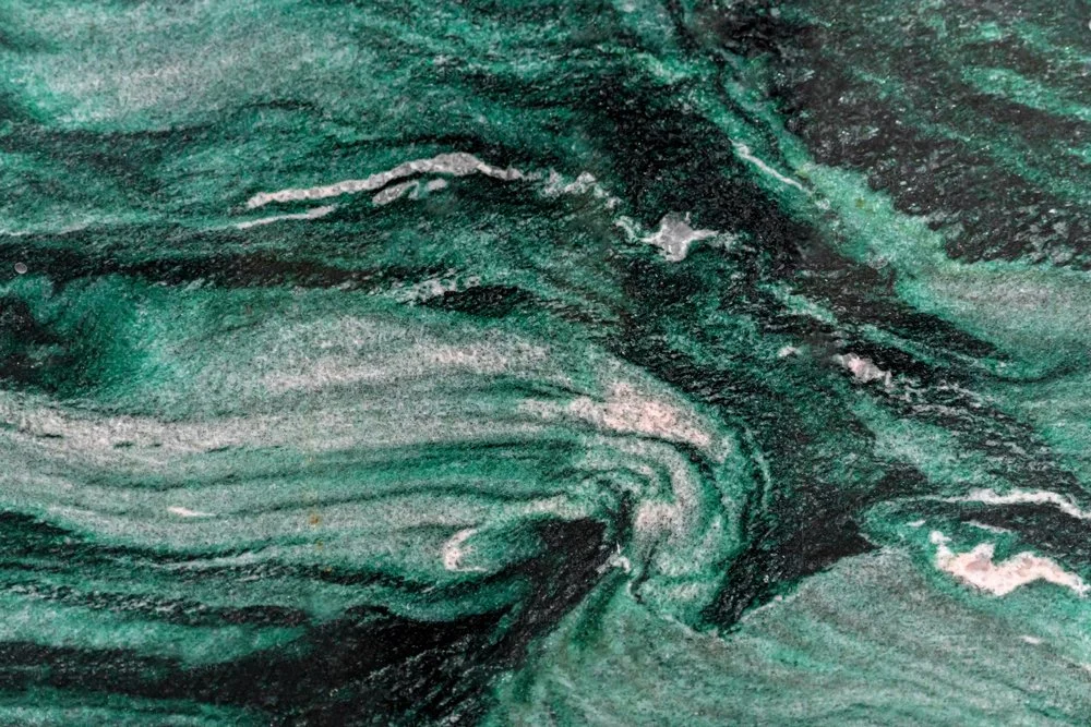 Swirling emerald green natural stone texture