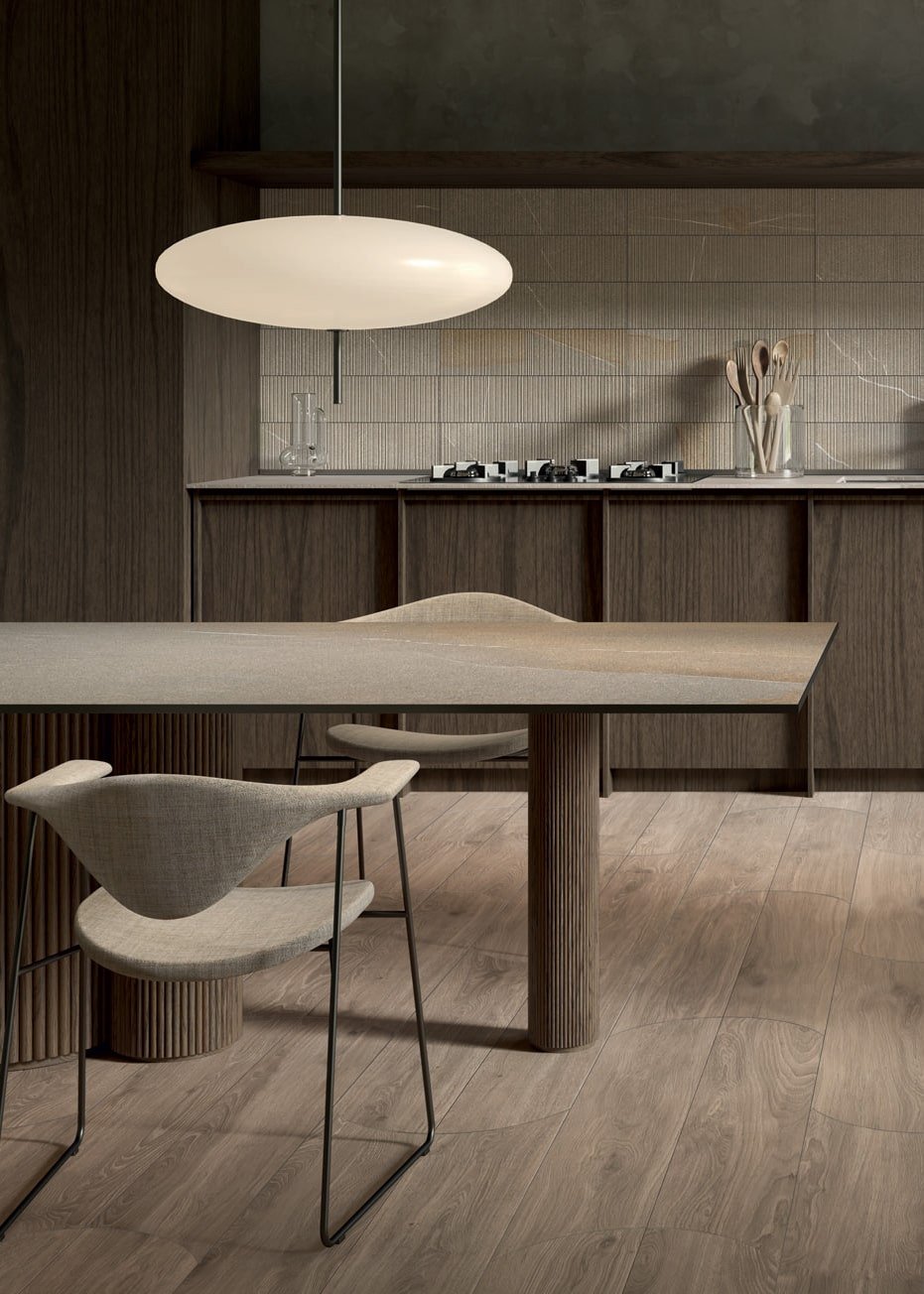 Porcelain tile with a wood herringbone pattern from the Cocoon collection for elevated interiors.