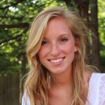 Silhouette of a person's head and shoulders against a light gray background.