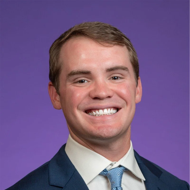 A blank, gray silhouette of a person's head and shoulders