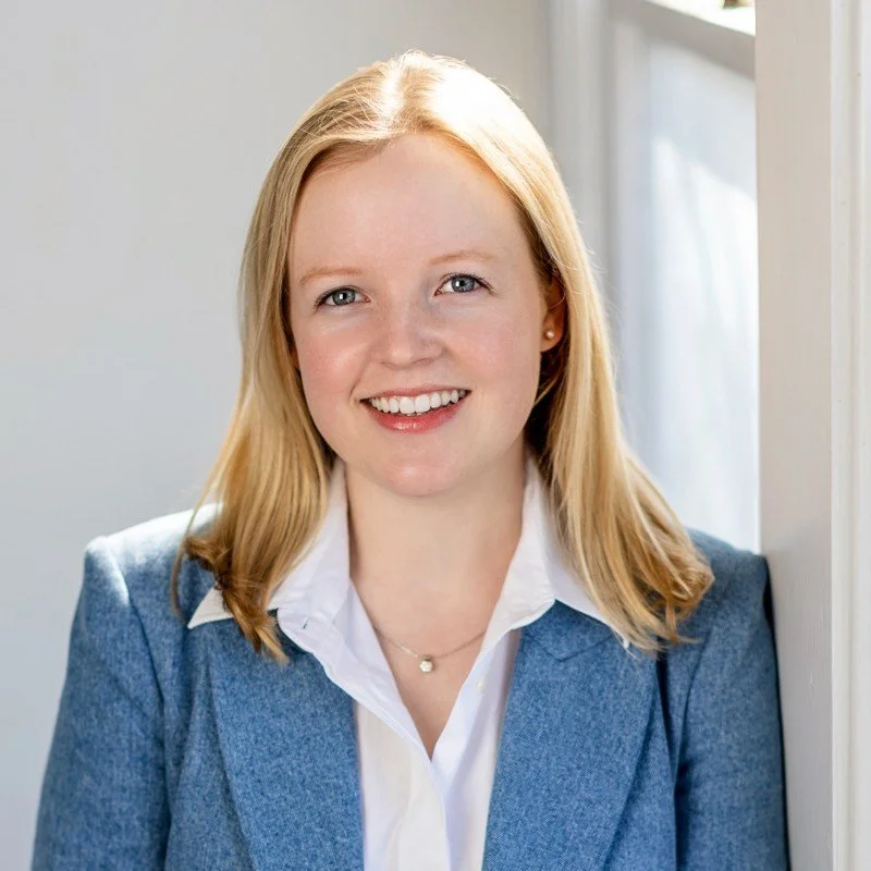 A gray silhouette of a person against a light gray background.