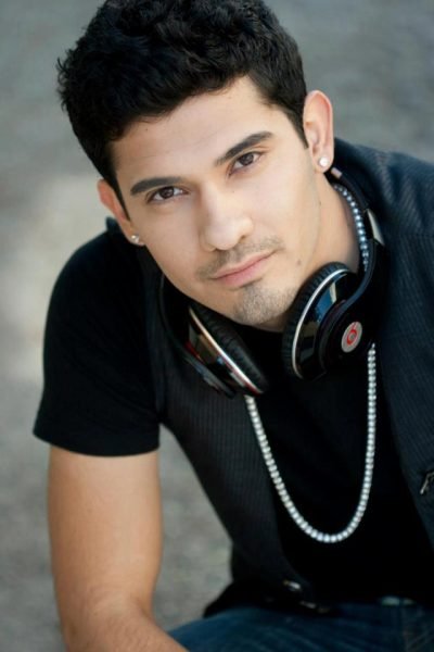 Headshot of Actor Andre Roman.jpeg