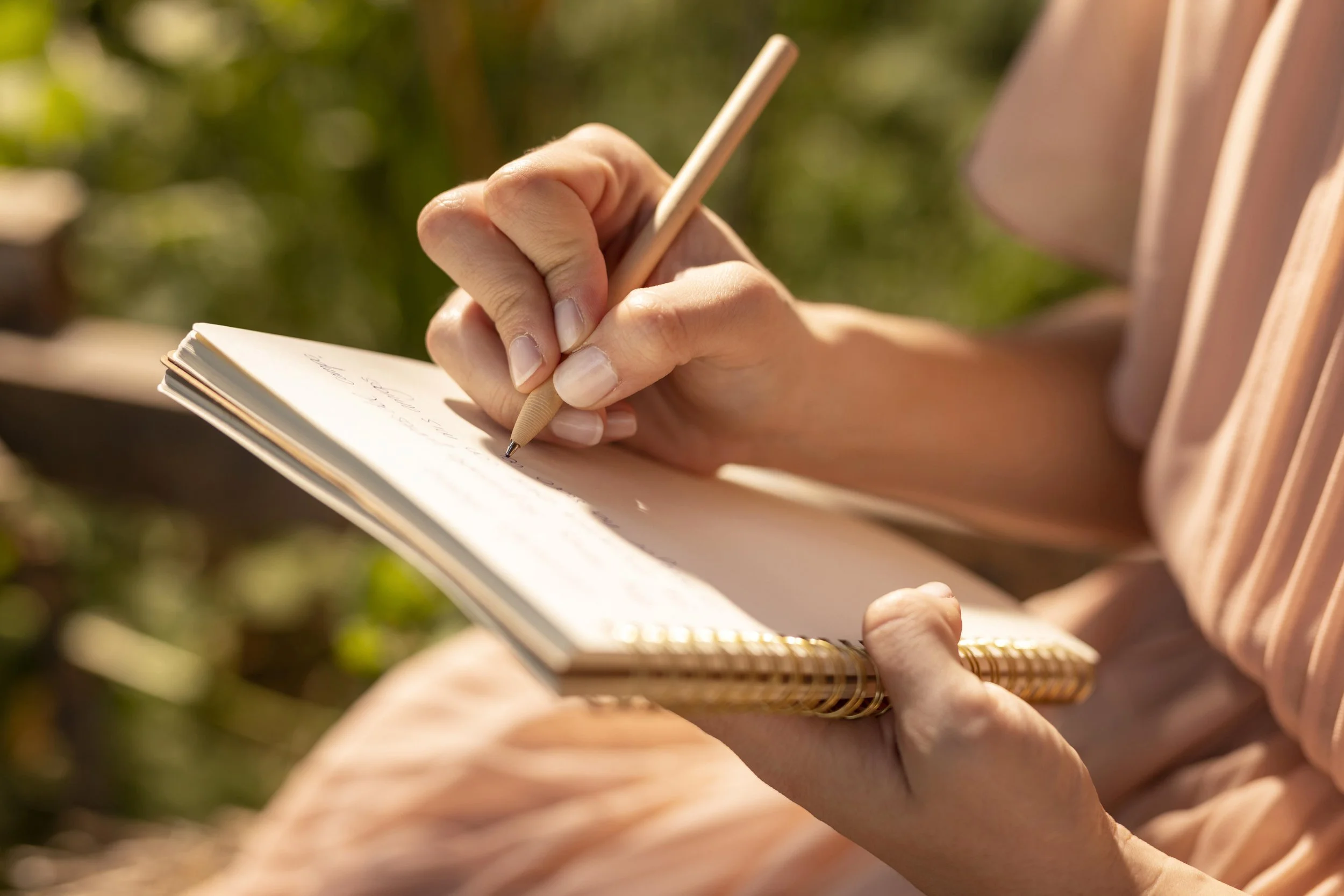 A person journaling, representing grounded online depression counselling sessions.