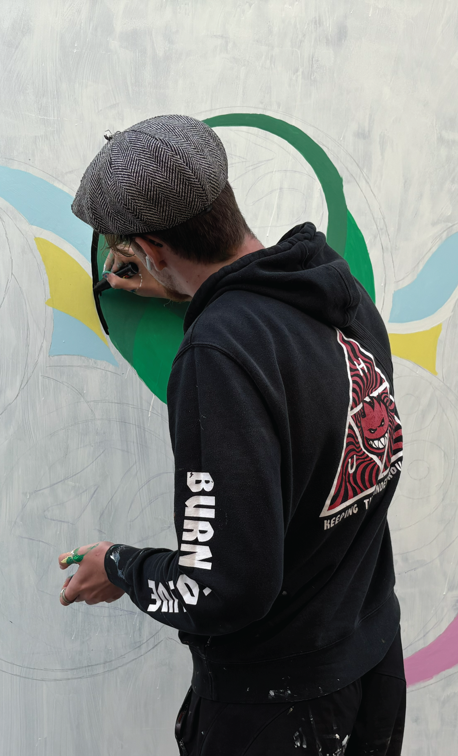 Vibrant superhero-themed bedroom mural for kids, professional hand-painted finish by Aidan Jack Waldron.