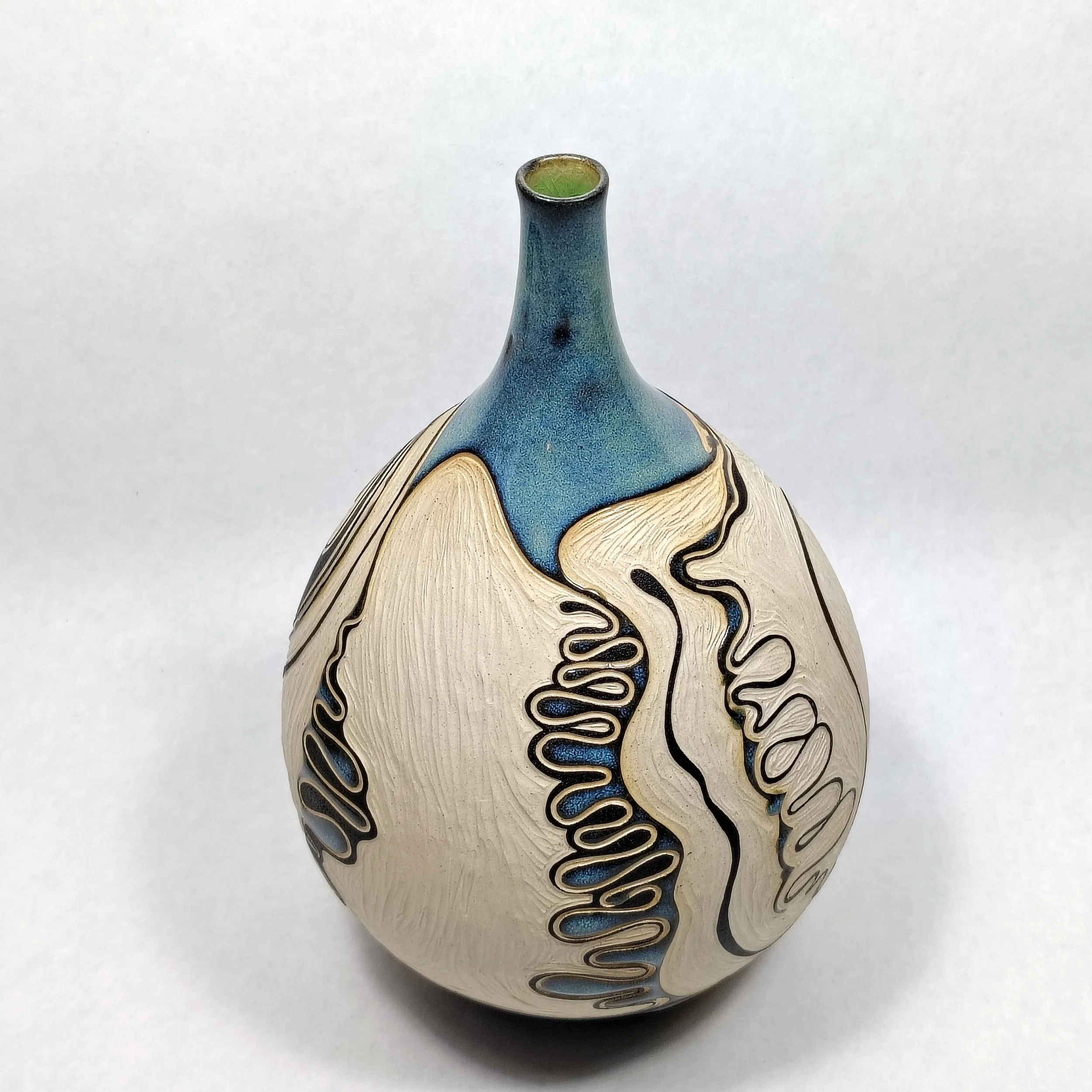 BE15-0049_VaseMeanderingRiverTallThinNeckBlue2_28_v1.jpg