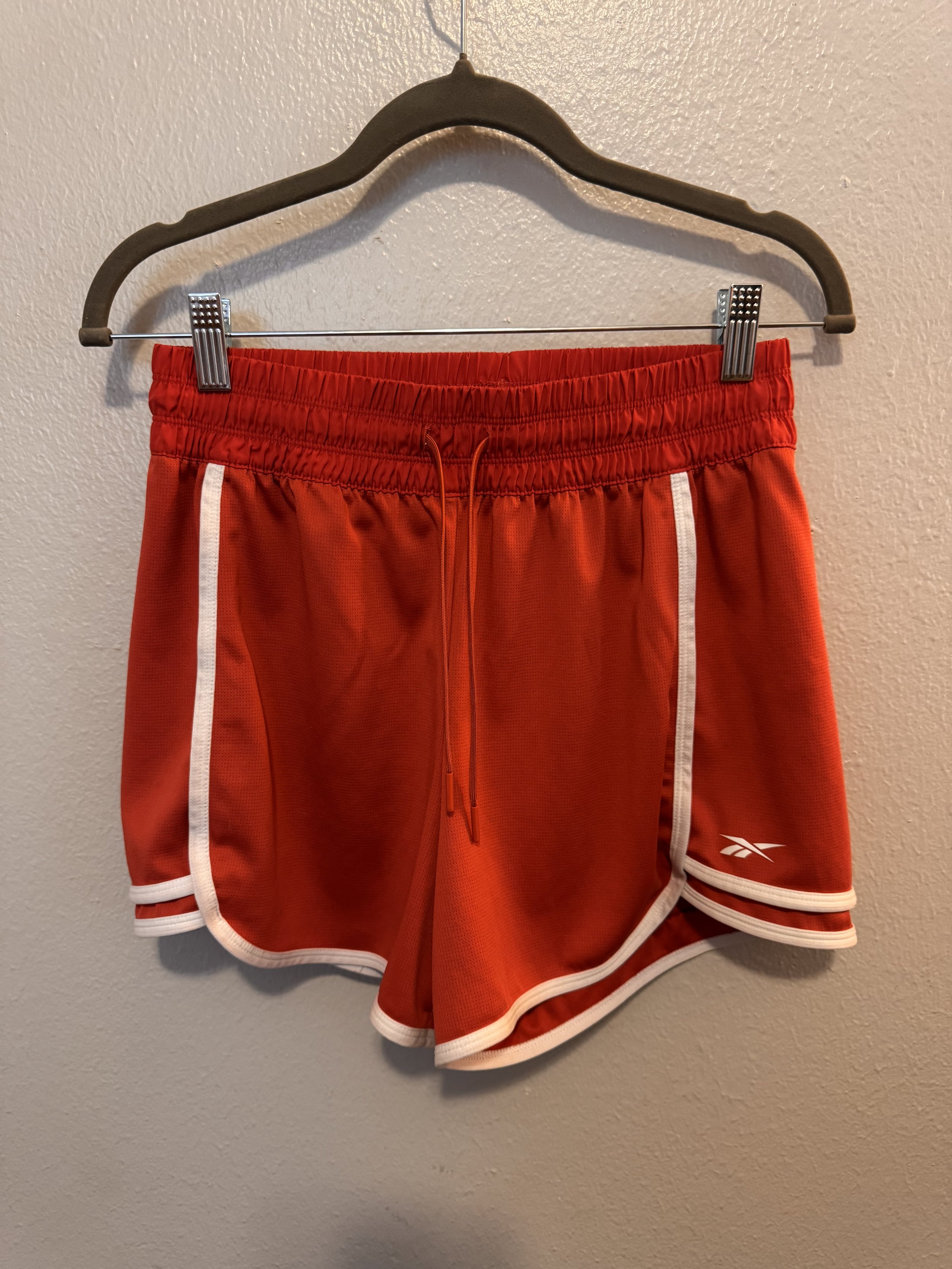 reebok orange-red shorts