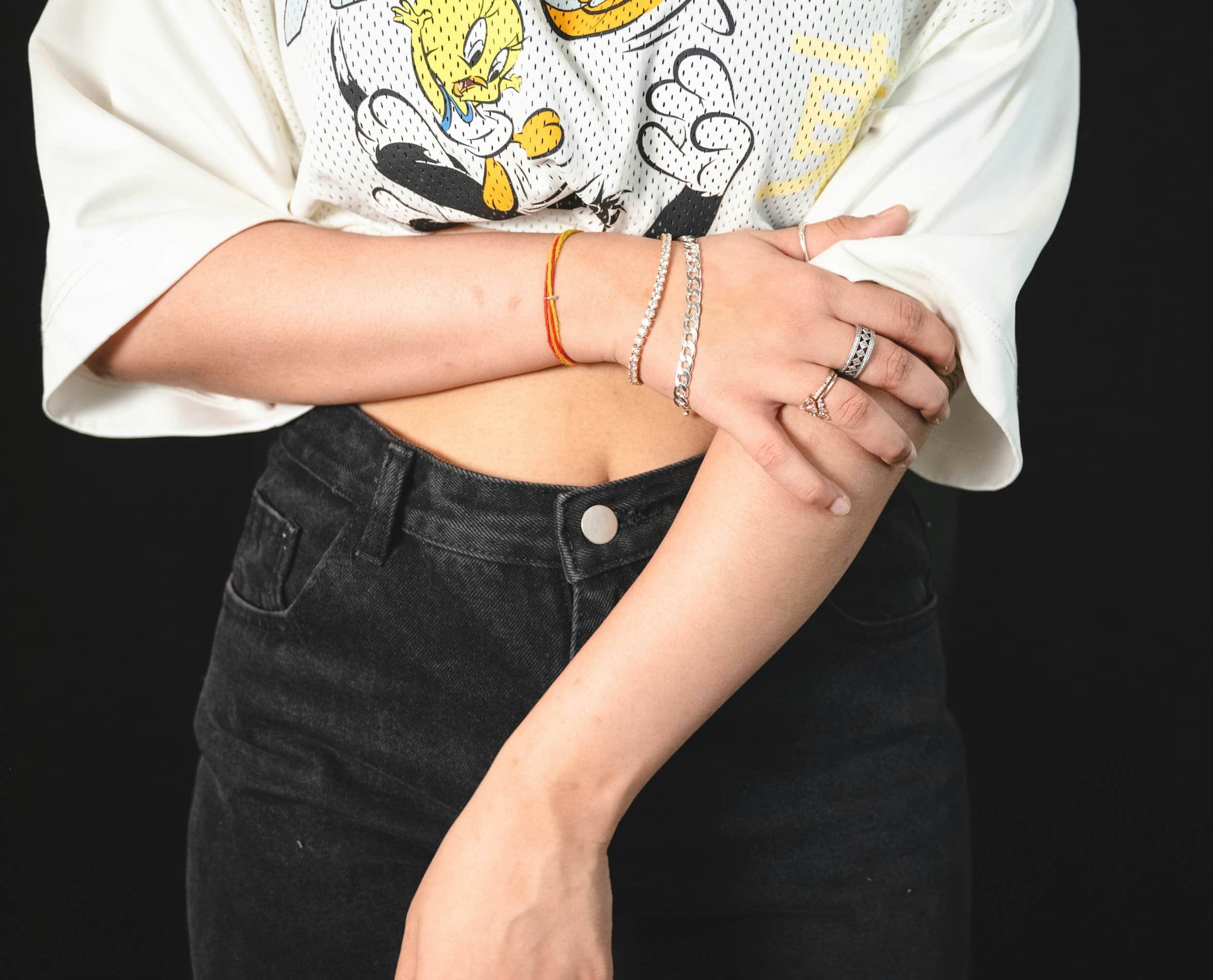 A stock image of someone grabbing their elbow because it hurts.