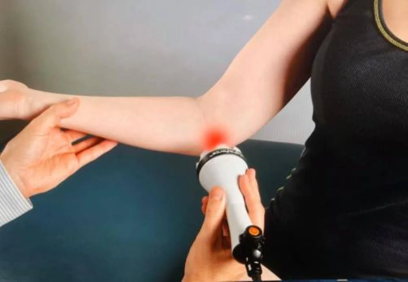 Class 4 laser therapy device being used to treat golfer's elbow. HILT.