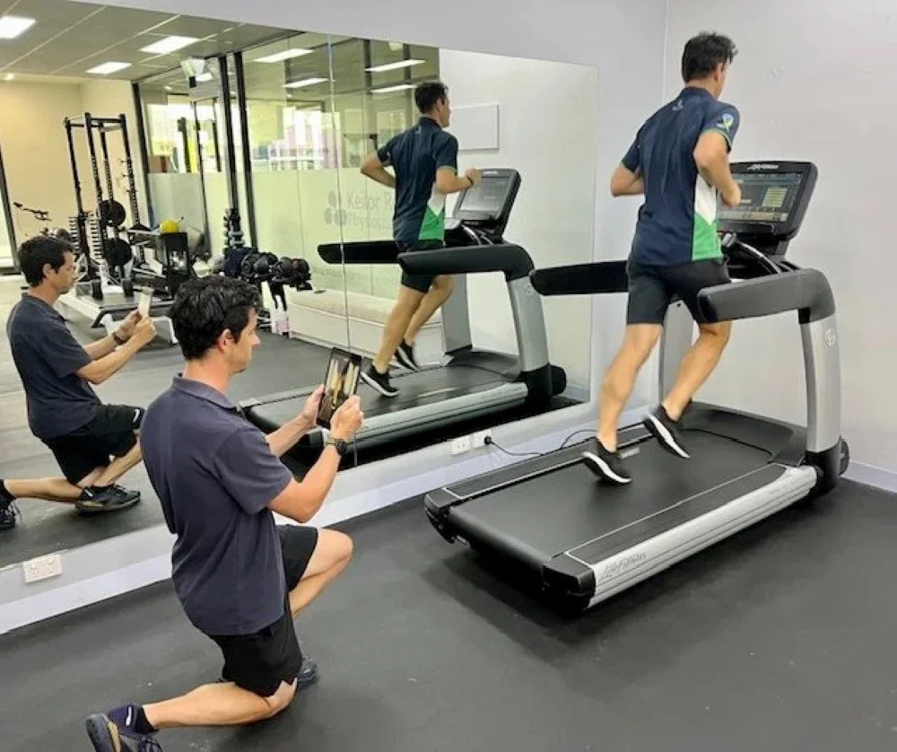 A physical therapist performing a gait analysis in Hillsboro, OR