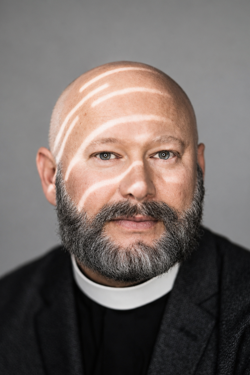 Canon to the Ordinary: Very Rev. Fr. Chad E. Jarnagin, Vicar of Luminous Parish, Franklin, TN. 

He has a Master Certificate, M.A. Biblical Studies, a Master of Divinity. He is also the author of books, Learning to Be: Reconstructing Peace & Spiritua