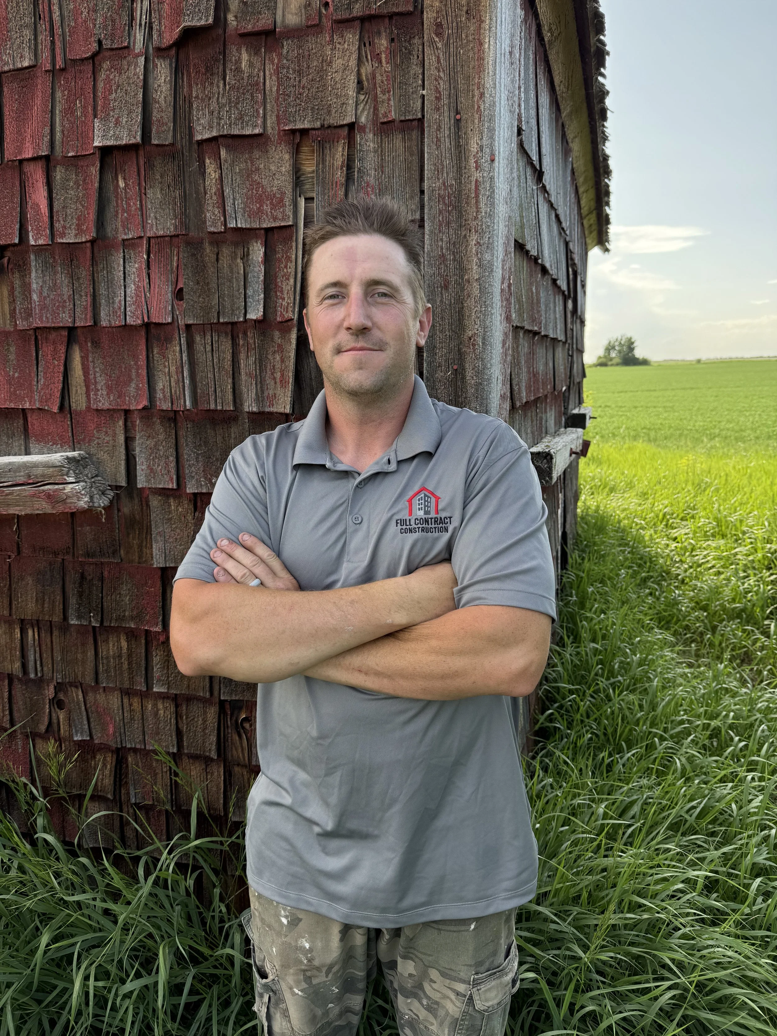 Line art illustration of a construction worker wearing a helmet with a side profile view.