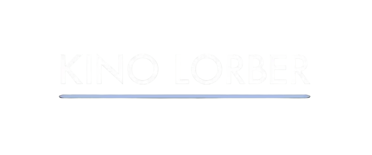 Close-up of a computer screen displaying the text 'KNO' with the rest of the word cut off and a blue keyboard below.