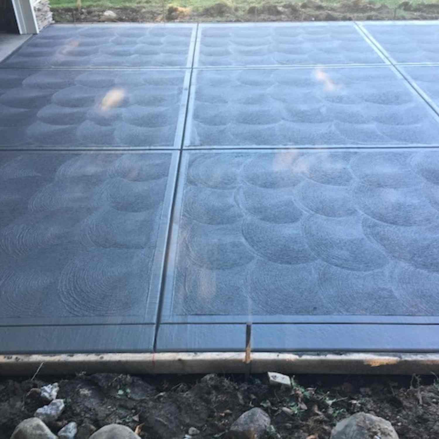 Close-up of a hand finished concrete driveway in Northeast Ohio.