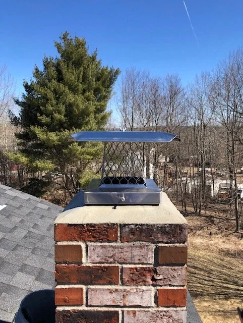 The "Wash" is masonry that is sloped to shed water. These are sacrificial as they take will deteriorate over time so your chimney does not.