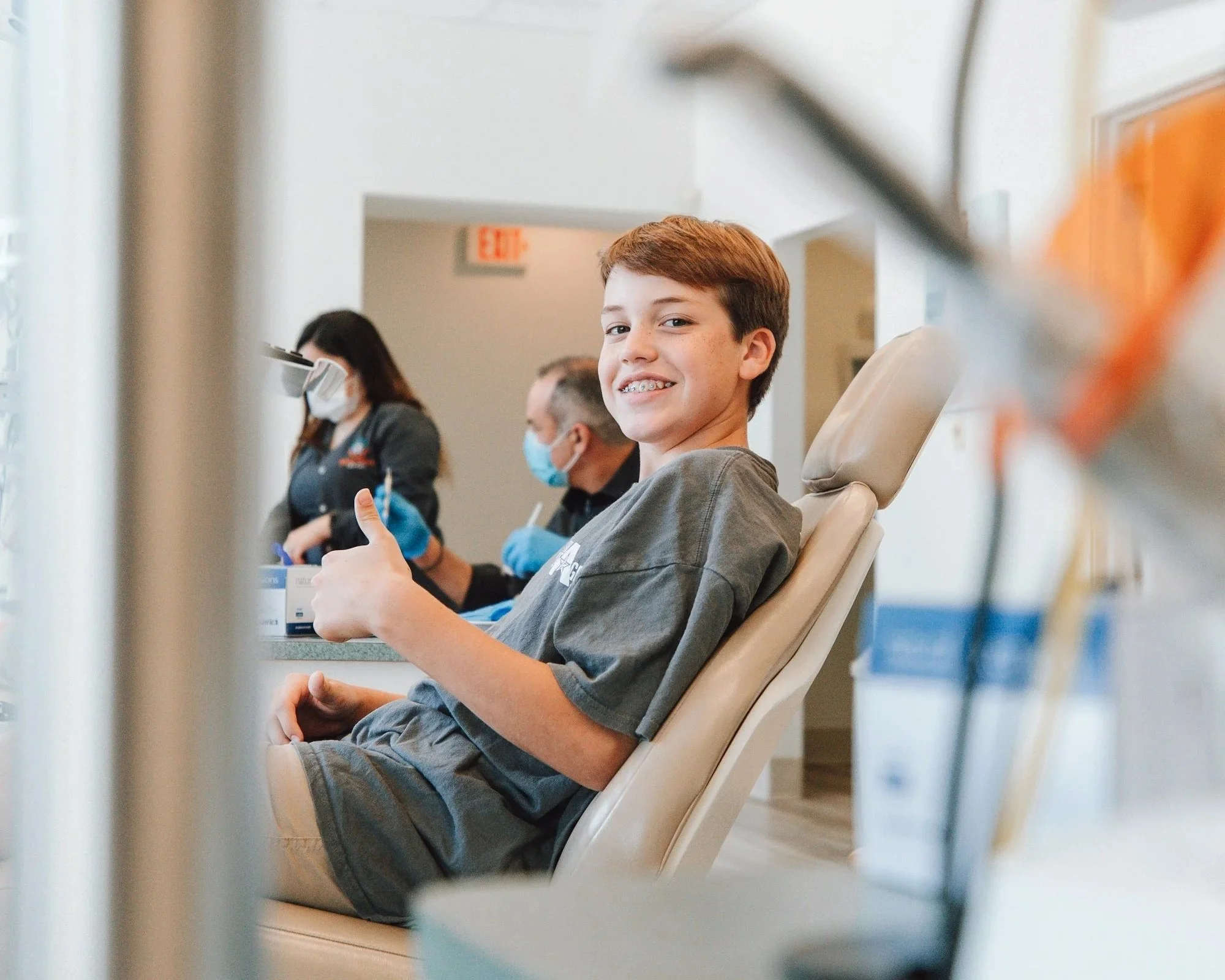 Happy child after a pediatric dental visit at Cura Dental NJ