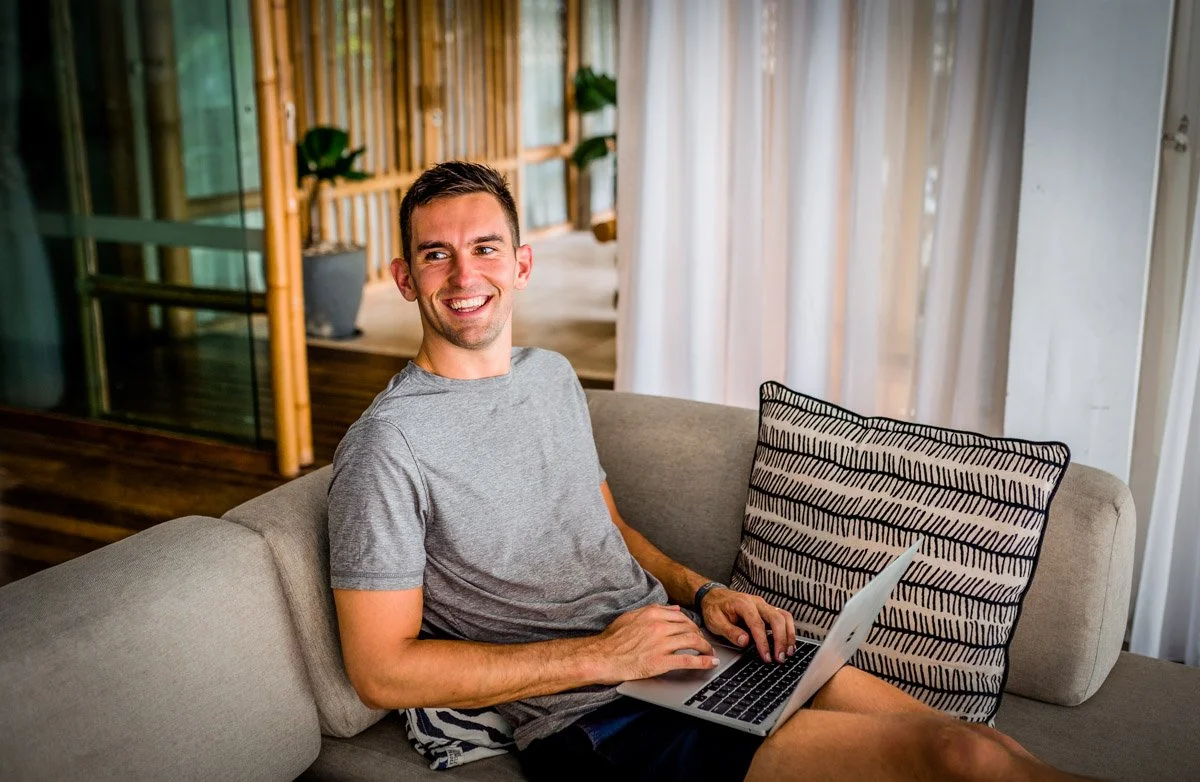 Me working remotely in Bali on my blog