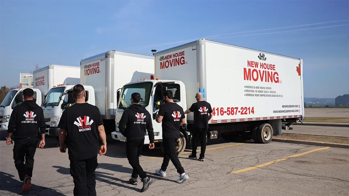 Professional movers with New House Moving trucks representing transparent price list, affordable moving rates, and trusted Toronto GTA moving services