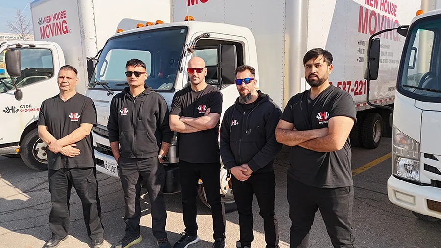 Licensed and insured professional movers in Toronto loading a moving truck for a residential move across the GTA