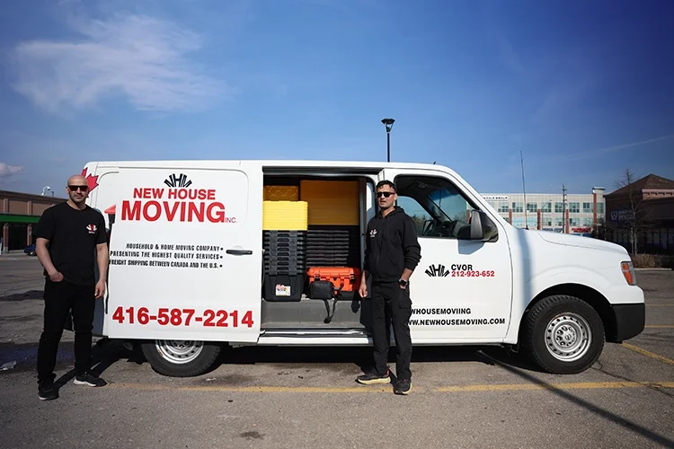 Licensed and insured professional movers in Toronto loading a moving truck for a residential move across the GTA