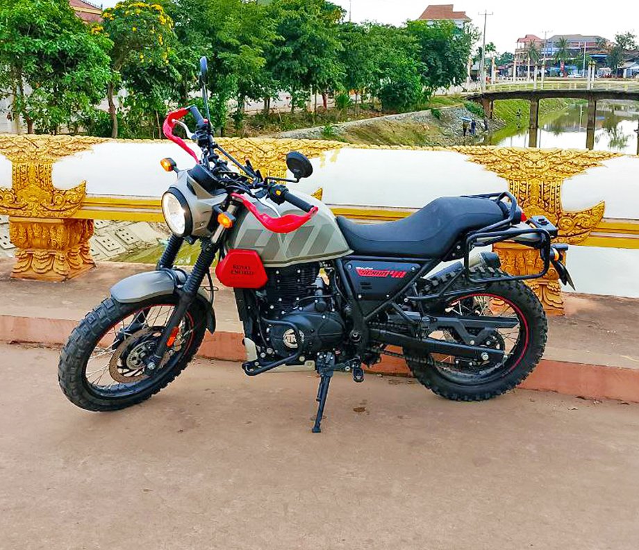 Grey and red Royal Enfield Scram 411 motorbike