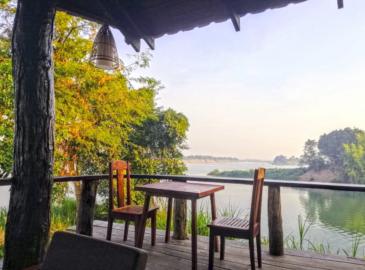 View of the Mekong river and nature from a wooden terrace