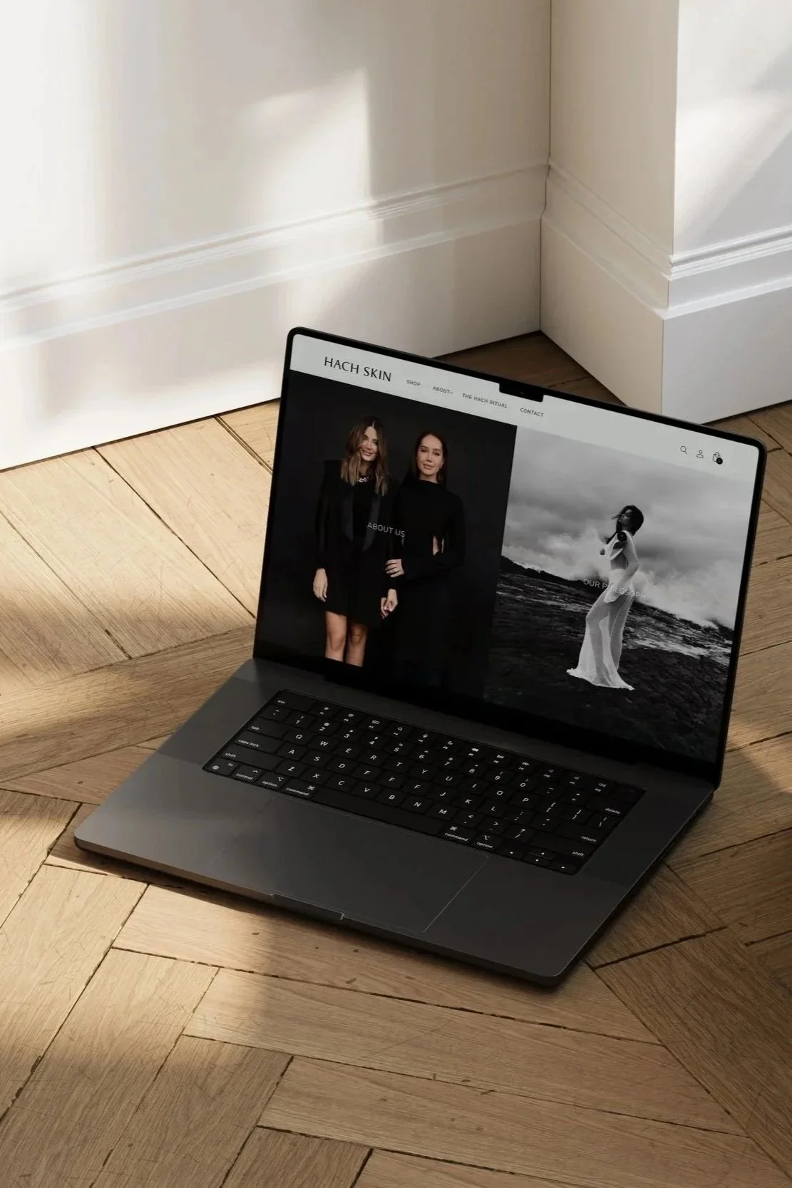 Laptop featuring a modern shopify website for HACH SKIN, designed by Failte Studio. Offering professional Squarespace and Shopify website design in Australia and internationally.