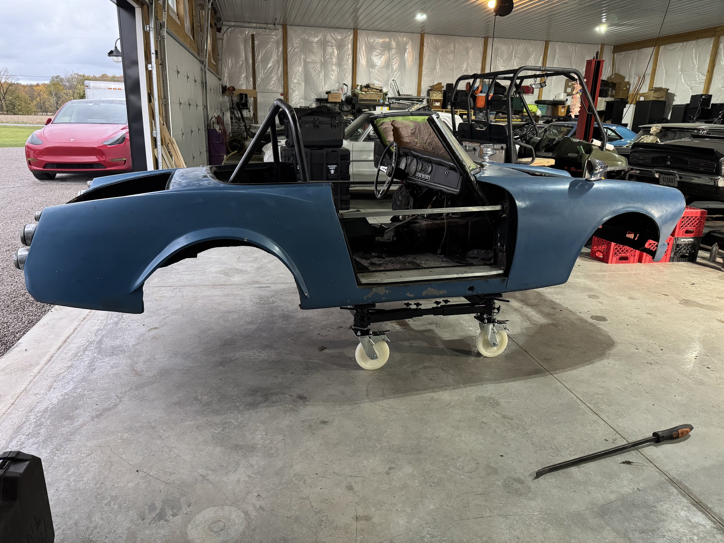 Body separated from the chassis for structural modifications.