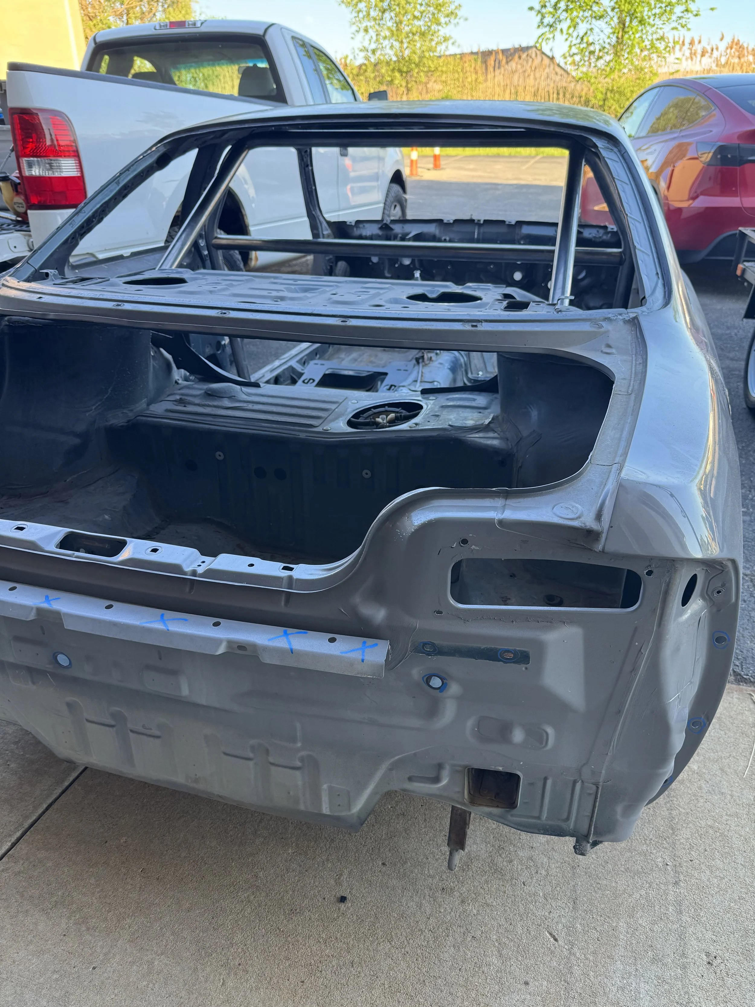 Custom roll bar integrated into a Nissan S14 chassis as part of chassis reinforcement and motorsport fabrication work.